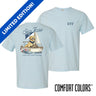 Light blue Comfort Colors t-shirt shown front and back; front features small Greek letters on the left chest, back displays a golden retriever sailing a boat with script text above and “Chasing Open Water” below.