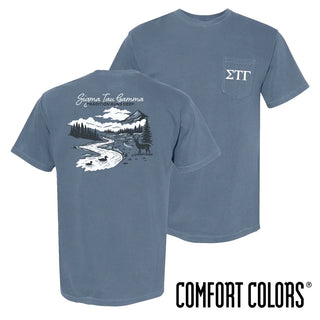 Sig Tau fraternity t-shirt featuring an outdoor nature scene.