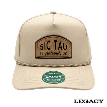 Cream Legacy brand rope hat featuring a brown fraternity patch, designed for stylish fraternity apparel and casual campus wear.